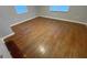 Spacious bedroom with wood floors and bright lighting at 2391 Randall Ave, Lithonia, GA 30058
