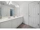 Spacious bathroom featuring a double vanity with white countertops and ample lighting at 295 River Laurel Way, Woodstock, GA 30188