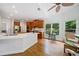 An eat-in kitchen featuring wood cabinets, stainless steel appliances, white countertops, and hardwood floors at 295 River Laurel Way, Woodstock, GA 30188