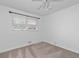 Bedroom featuring a carpeted floor, ceiling fan, and natural lighting at 4052 Shawnee Ne Ln, Brookhaven, GA 30319