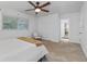 Bedroom with carpet, closet, ceiling fan, and bright natural light at 4052 Shawnee Ne Ln, Brookhaven, GA 30319