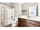 Bathroom with vanity and tub-shower combo at 4779 Moon Hollow Ct, Buford, GA 30519
