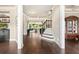 Spacious foyer with hardwood floors, coffered ceiling, and open view to the living room at 4779 Moon Hollow Ct, Buford, GA 30519