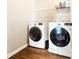 Convenient laundry room with front-load washer and dryer at 4779 Moon Hollow Ct, Buford, GA 30519