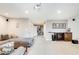 Finished basement with a large seating area, bar, and walkout access at 1205 Druid Knoll Ne Dr, Brookhaven, GA 30319