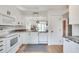 Bright kitchen featuring white cabinets, stainless steel appliances and granite countertops at 1205 Druid Knoll Ne Dr, Brookhaven, GA 30319
