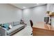 Home office space with comfortable seating, desk, and natural light at 1205 Druid Knoll Ne Dr, Brookhaven, GA 30319
