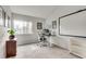 Well-lit home office with a whiteboard and a large window at 1205 Druid Knoll Ne Dr, Brookhaven, GA 30319
