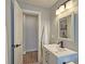 Bathroom view highlighting modern vanity, mirror, and fixtures at 217 Penelope Nw Dr, Atlanta, GA 30314