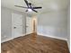Empty bedroom with hardwood floors and ceiling fan at 217 Penelope Nw Dr, Atlanta, GA 30314