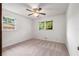Bedroom featuring neutral carpet, natural light, and neutral paint at 4444 Bending River Sw Trl, Lilburn, GA 30047