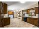 Spacious kitchen featuring a laundry room and access to the exterior at 4444 Bending River Sw Trl, Lilburn, GA 30047