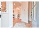 Inviting foyer with hardwood floors and an open view at 5641 Tisbury Ct, Hoschton, GA 30548
