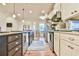 Well-equipped kitchen with modern appliances and ample counter space at 5641 Tisbury Ct, Hoschton, GA 30548