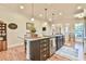 Spacious kitchen island with a sink and plenty of storage space at 5641 Tisbury Ct, Hoschton, GA 30548