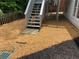 A view of the house, backyard and stairs leading to the deck at 710 Glen Royal Dr, Roswell, GA 30076