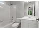 Bathroom with white tile, shower and bathtub at 710 Glen Royal Dr, Roswell, GA 30076