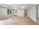 Living room featuring a closet, back door and view to the backyard at 710 Glen Royal Dr, Roswell, GA 30076