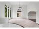 Spacious living area featuring high ceilings, arched windows, and an open floor plan at 710 Glen Royal Dr, Roswell, GA 30076