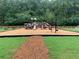 Community playground with slides, swings, and climbing structures, perfect for Gathering fun and recreation at 710 Glen Royal Dr, Roswell, GA 30076