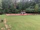 Community playground with slides, swings, and climbing structures, perfect for Gathering fun and recreation at 710 Glen Royal Dr, Roswell, GA 30076
