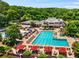 Stunning view of a community pool area with lounge chairs and umbrellas, ideal for relaxation and recreation at 710 Glen Royal Dr, Roswell, GA 30076