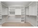 Walk-in closet with shelving, and hanging rods at 710 Glen Royal Dr, Roswell, GA 30076