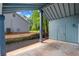 Cozy back porch with view of the yard at 7629 Park Ln, Jonesboro, GA 30236