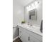 Well-lit bathroom featuring modern vanity with white countertop and updated fixtures at 7629 Park Ln, Jonesboro, GA 30236