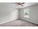 Bedroom with neutral walls and carpet at 7629 Park Ln, Jonesboro, GA 30236