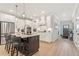 Modern kitchen featuring a large island with seating, stainless steel appliances, and ample cabinet space at 3672 Silvery Way, Powder Springs, GA 30127