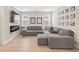 Cozy living room features a stylish sectional sofa, electric fireplace, and modern decor at 3672 Silvery Way, Powder Springs, GA 30127