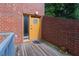 Private outdoor patio area with brick siding, perfect for relaxing and enjoying the fresh air at 381 Ralph Mcgill Ne Blvd # K, Atlanta, GA 30312