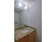Well-lit half bathroom showcasing a granite countertop vanity and a large mirror at 381 Ralph Mcgill Ne Blvd # K, Atlanta, GA 30312