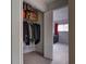 Walk-in closet featuring ample hanging space with clothing racks and overhead storage for boxes at 381 Ralph Mcgill Ne Blvd # K, Atlanta, GA 30312
