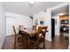 Charming dining area with hardwood floors, wooden furniture, and decor, next to an updated kitchen at 381 Ralph Mcgill Ne Blvd # K, Atlanta, GA 30312