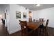 Inviting dining room boasts wood floors and a wooden table, perfect for gatherings and dining at 381 Ralph Mcgill Ne Blvd # K, Atlanta, GA 30312