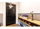 Stylish entryway with a black door, decorative plants, and modern shelving for added appeal at 1125 Briarcliff Ne Pl # 14, Atlanta, GA 30306