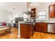 Bright kitchen with stainless steel appliances, dark granite countertops, and open to the living room at 1125 Briarcliff Ne Pl # 14, Atlanta, GA 30306