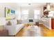 Inviting living room filled with natural light, hardwood flooring, and minimalist decor throughout at 1125 Briarcliff Ne Pl # 14, Atlanta, GA 30306