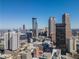 Panoramic aerial shot showcases a bustling cityscape with prominent skyscrapers and architectural landmarks at 20 Marietta Nw St # 15D, Atlanta, GA 30303