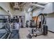 Well-equipped gym with treadmills, weights, and exercise equipment for a complete workout at 20 Marietta Nw St # 15D, Atlanta, GA 30303