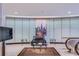 Elegant lobby with comfortable seating, TV, and an art piece adds a touch of sophistication at 20 Marietta Nw St # 15D, Atlanta, GA 30303