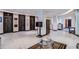 View of a bright, modern lobby with elevator banks and a comfortable seating area at 20 Marietta Nw St # 15D, Atlanta, GA 30303