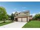 Attractive two-story home with a brick facade and a two-car garage at 2229 Polder Way, Austell, GA 30168