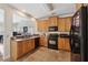 Efficient kitchen with ample counter space, modern appliances, and tile floors at 2229 Polder Way, Austell, GA 30168