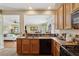 Open kitchen featuring a sink and modern appliances with an open view to living spaces at 2229 Polder Way, Austell, GA 30168
