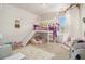 Charming ' bedroom with a loft bed and play area at 2404 Fitts Dr, Conyers, GA 30094