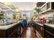 Modern kitchen with a center island, stainless steel appliances, and hardwood floors at 2404 Fitts Dr, Conyers, GA 30094