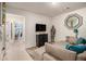 Cozy living room features a comfortable couch and decorative accents throughout at 2404 Fitts Dr, Conyers, GA 30094